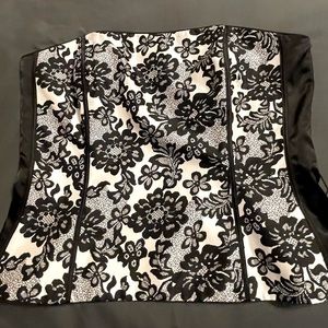 Beautiful WHBM bustier size 14. Tried on but never worn. Has satin belt.